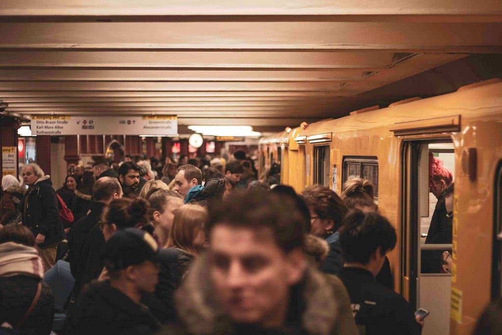 people sitting on chair inside building - ADHD overstimulation